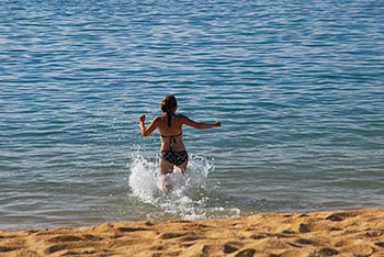 Enjoy a swim at Kaiteriteri Beach